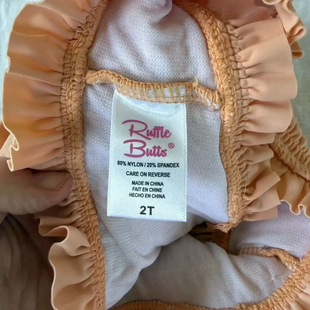 Rufflebutts Melon Smocked Bikini Size 2T Ruffle Flutter Sleeve Orange